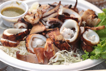 Grilled squid of delicious with seafood sauce.