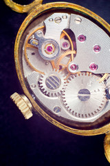 Naklejka premium Analog clock metal mechanism close up