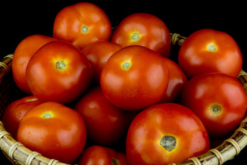 Basket of Fresh Tomatoes on Black Background