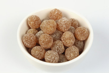 sweet candy in the white cup