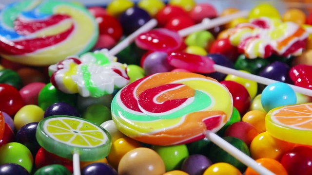 Multi-colored sweets, lollipops and chewing gum