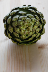 Fototapeta premium artichoke on wooden table