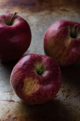 apple on steel plate