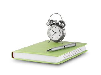 Diary with pen and alarm clock