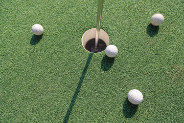 Four golf balls