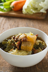 Chinese vegetable stew. Mixed of vegetables, tofu and pork on wo