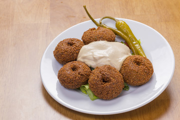 fresh arabian falafel with yogurt sauce
