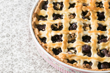 homemade cherry pie with walnuts and a crispy crust