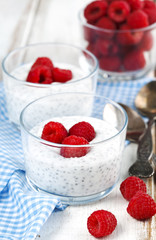 Yogurt with chia seeds and fresh raspberries for healthy breakfa