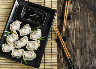 Pork and vegetable wonton with soy sauce © Anjelika Gretskaia