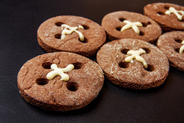 Chocolate chips cookies isolated on black