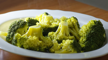 Steamed broccoli in a plate close up