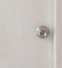 focus knob on wood door background