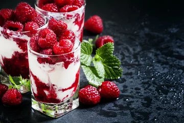 Gardinen Vanilla ice cream with raspberries and mint dessert served in gl © 5ph