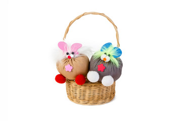 Toy recycle from rag in weave wicker basket isolated on white ba