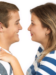 A smiling teen couple - the guy and the girl