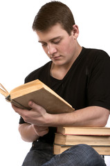 Young man reading a book