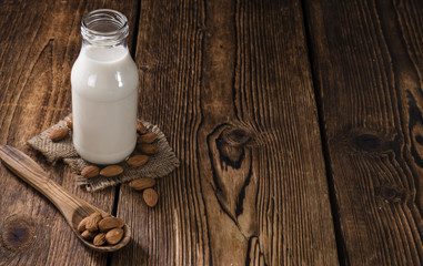 Fresh made Almond Milk (selective focus) - obrazy, fototapety, plakaty