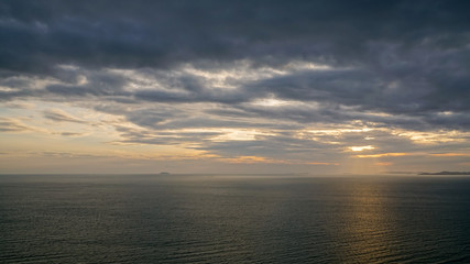 Obraz premium Dramatic Dark Clouds sky over sea