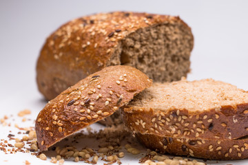 seed bread, a slice cut on white background