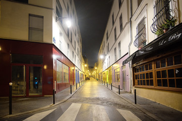 Paris, France, February 9, 2016: view of a street in a center of Paris, France in a night