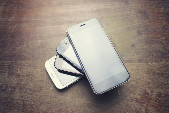 Many Phones On Table