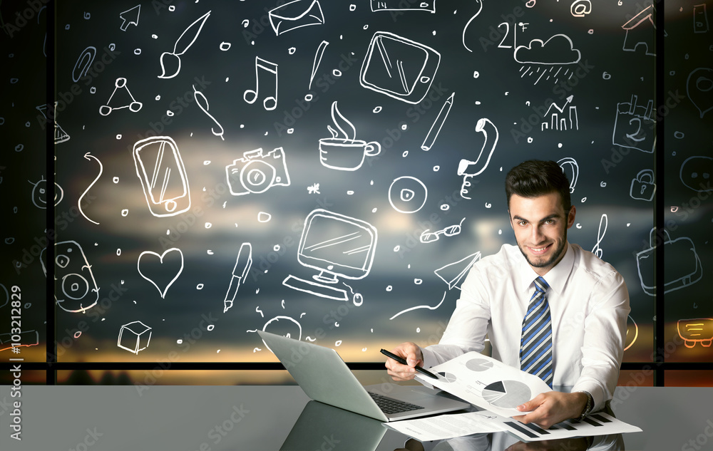 Wall mural Businessman with social media symbols