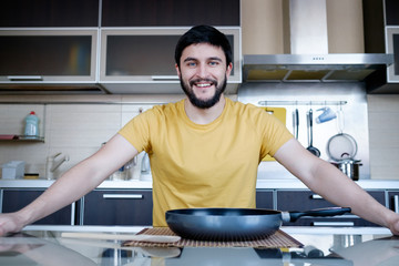 Bearded man in the kitchen