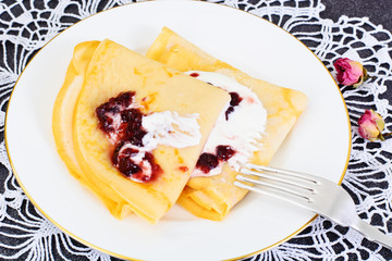 Tasty Pancakes Stack with Cream and Jam