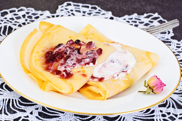 Tasty Pancakes Stack with Cream and Jam