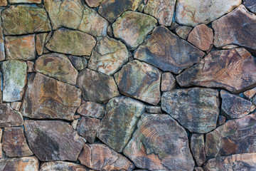 Fototapeta premium Real stone wall surface with cement.