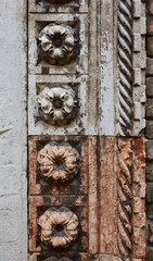Marble flower from gothic portal of San Grerogio church