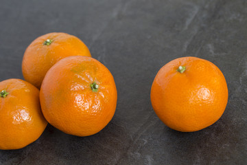 Mandarin Oranges on the slate background
