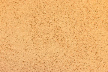 Texture concrete wall with small holes.