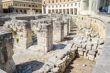 Fototapeta na wymiar The Roman amphitheatre in Sant'Oronzo square, Lecce, Salento