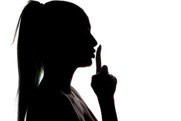 silhouette of a woman with a finger in front of lips on a white background