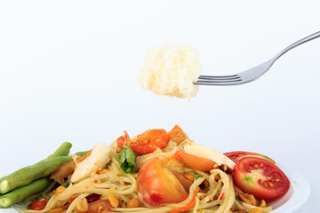 Thai food, Spicy green papaya salad with salted egg (Som Tum Thai Kai Kem) with Sticky rice on White Background