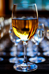 Glasses of vodka on wooden table