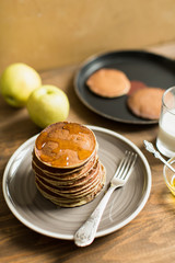 Delicious pancakes close up, with honey