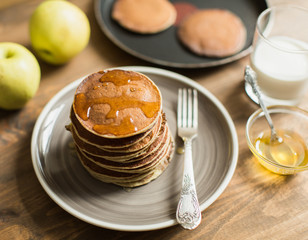 Delicious pancakes close up, with honey