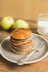 Delicious pancakes close up, with honey