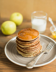Delicious pancakes close up, with honey