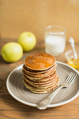 Delicious pancakes close up, with honey