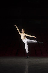 Fototapeta na wymiar Male ballet dancer on one leg.