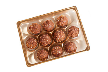 A plastic tray with milk chocolate sweets