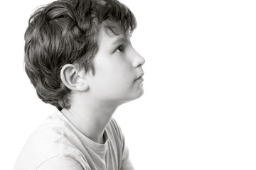 black and white portrait of a boy in profile