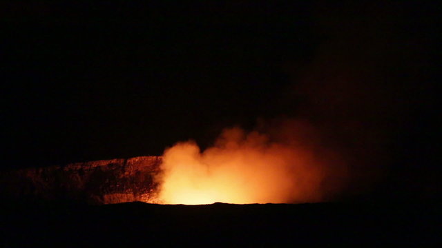 Hawaii - Hawaiian volcano: Halemaumau crater within the Kilauea Volcano caldera inside hawaii volcanoes national park. Glowing at night.