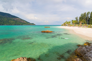 Sunrise beach with blue cloud sky in Koh Lipe island.