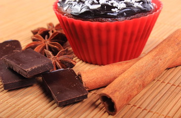 Muffins with desiccated coconut, chocolate, anise and cinnamon