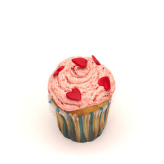 Birthday cupcake with butter cream isolated on white.